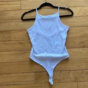White rubber bodysuit